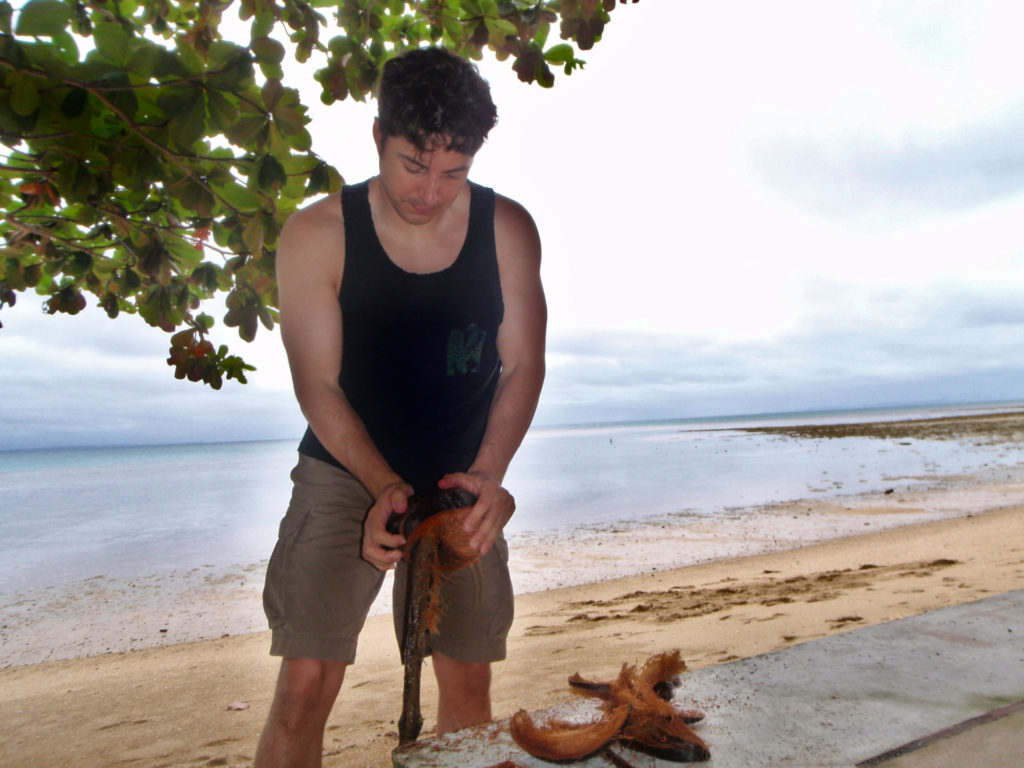 Top 11 Activities to do in Fiji Boating Coconut husking