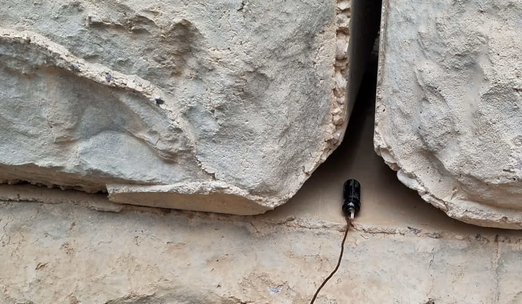 Geocaching in Arizona micro in a wall