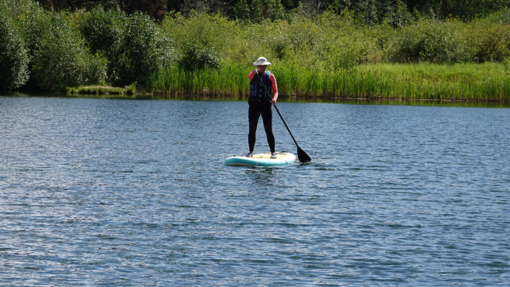 standing stand up paddle boarding, forever sabbatical 